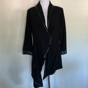 Umgee black asymmetrical jacket for an artsy fashion look.